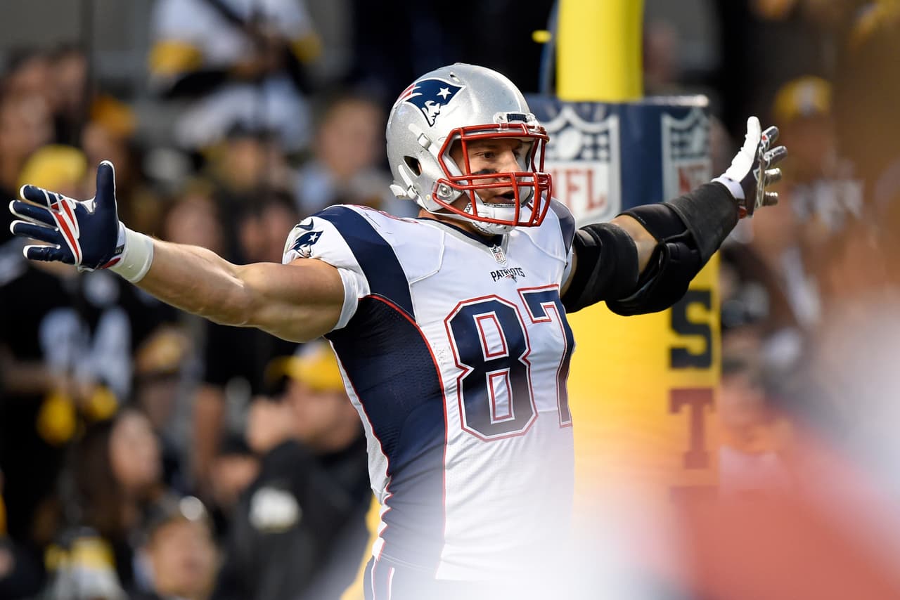 New England Patriots tight end Rob Gronkowski (87) celebrates his touchdown during the second half of an NFL football game in Pittsburgh, Sunday, Oct. 23, 2016. (AP Photo/Jared Wickerham)