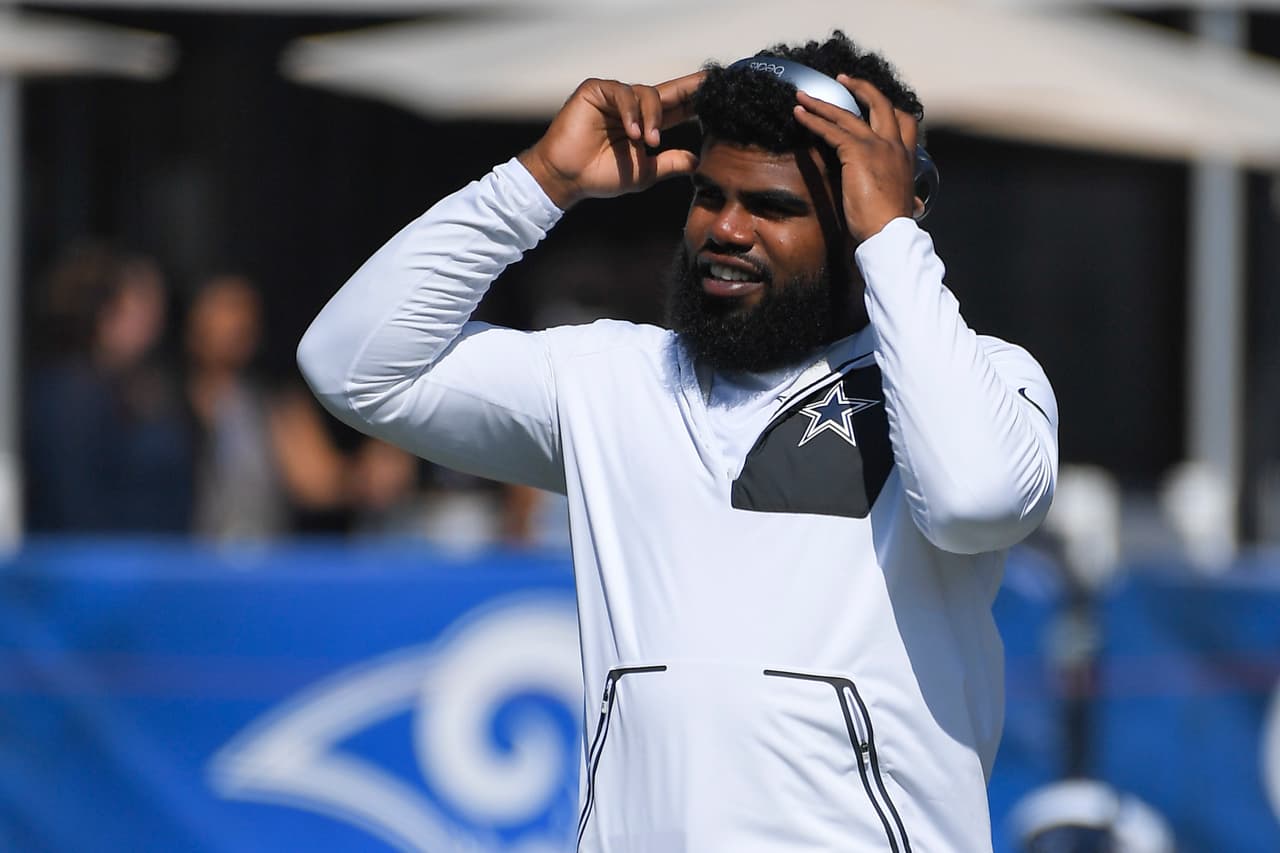Dallas Cowboys running back Ezekiel Elliott runs a drill before the Los Angeles Rams play the Cowboys in a preseason NFL football game Saturday, Aug. 12, 2017, in Los Angeles. (AP Photo/Mark J. Terrill)