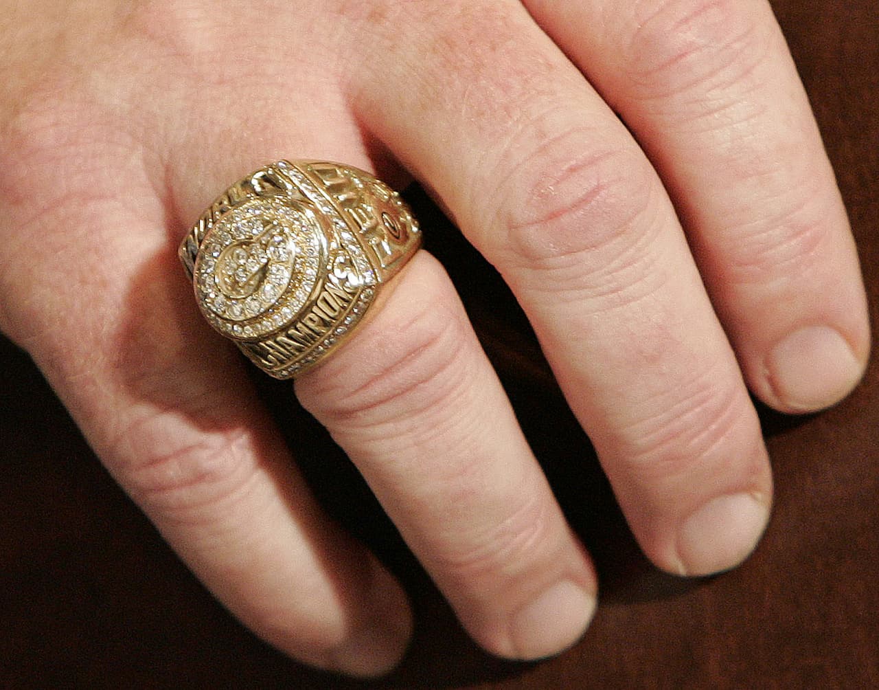 Hay un anillo de Super Bowl en la colección de Reid, pero llegó cuando era el entrenador de quarterbacks de los Green Bay Packers y asistente de Mike Holmgren en el Super Bowl XXXI.