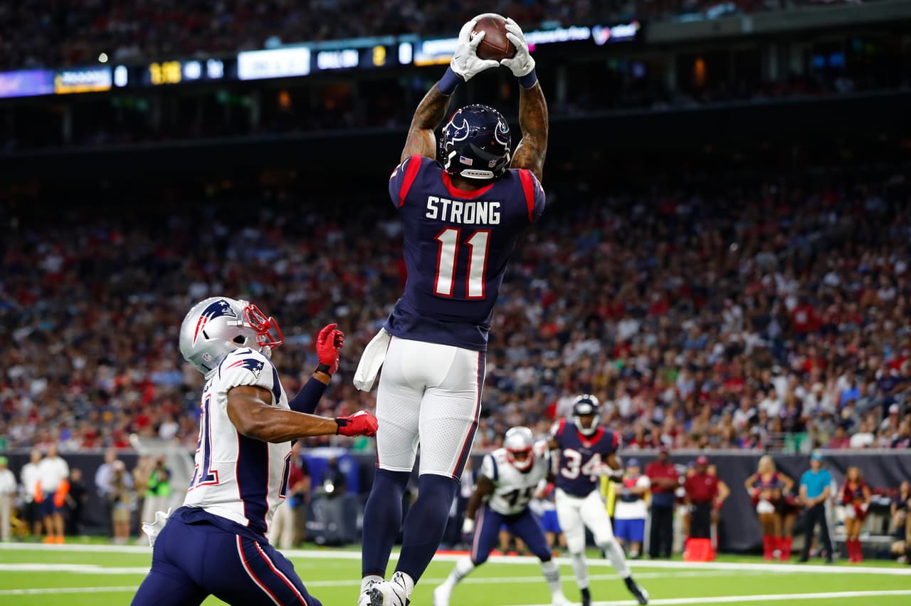 Houston Texans wide receiver Jaelen Strong (11) catches a touchdown pass against Patriots defensive back Malcolm Butler (21) during a Week 2 NFL preseason game against the New England Patriots in Houston on Saturday August 19, 2017. The Texans beat the Patriots 27-23 (Matt Patterson via AP)
