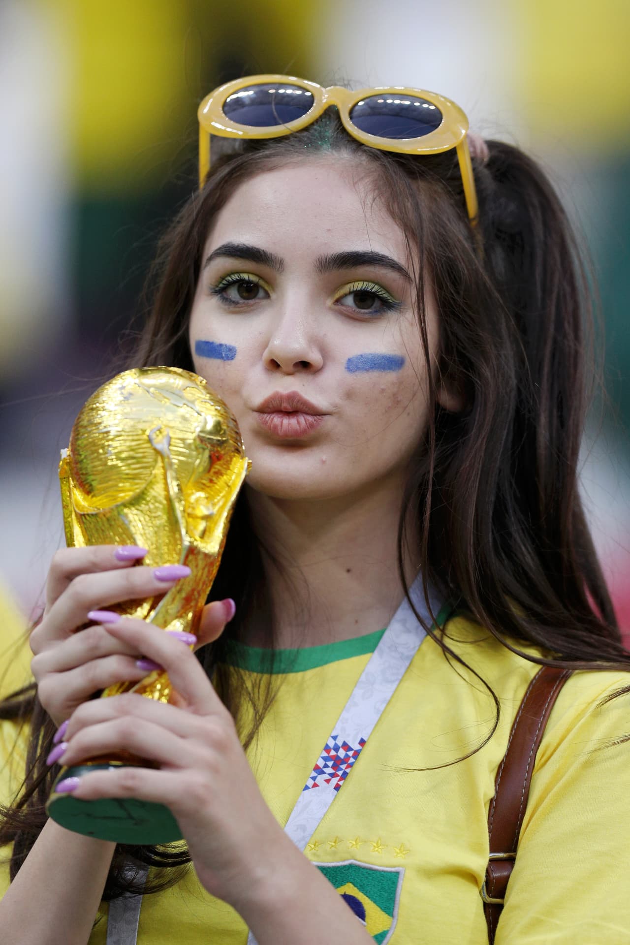 KAZAN, RUSSIA - JULY 06: Brazil fans enjoy the pre match atmosphere prior to the 2018 FIFA World Cup Russia Quarter Final match between Brazil and Belgium at Kazan Arena on July 6, 2018 in Kazan, Russia. (Photo by Buda Mendes/Getty Images)
