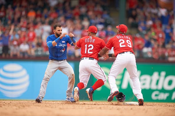 Baseball: Texas Rangers Rougned Odor (12) landing punch vs Toronto Blue Jays Jose Bautista (19) during fight at Globe Life Park in Arlington. Sequence. Arlington, TX 5/15/2016 CREDIT: Greg Nelson (Photo by Greg Nelson /Sports Illustrated/Getty Images) (Set Number: SI384 TK1 )