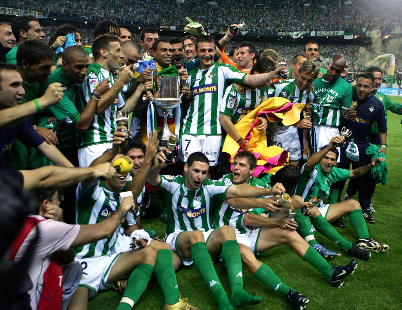 MADRID, SPAIN - JUNE 11: Real Betis players gather to celebrate with the trophy after beating Osasuna in a Kings Cup final on June 11, 2005 at the Calderon Stadium in Madrid, Spain. (Photo by Denis Doyle/Getty Images)