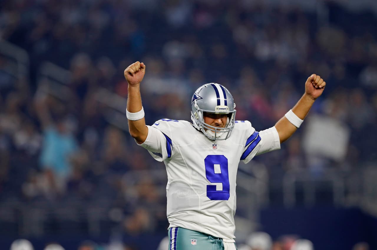 Dallas Cowboys quarterback Tony Romo (9) celebrates after throwing a touchdown pass during an NFL preseason football game against the Miami Dolphins on Friday, Aug. 19, 2016, in Arlington, Texas. (Aaron M. Sprecher via AP)