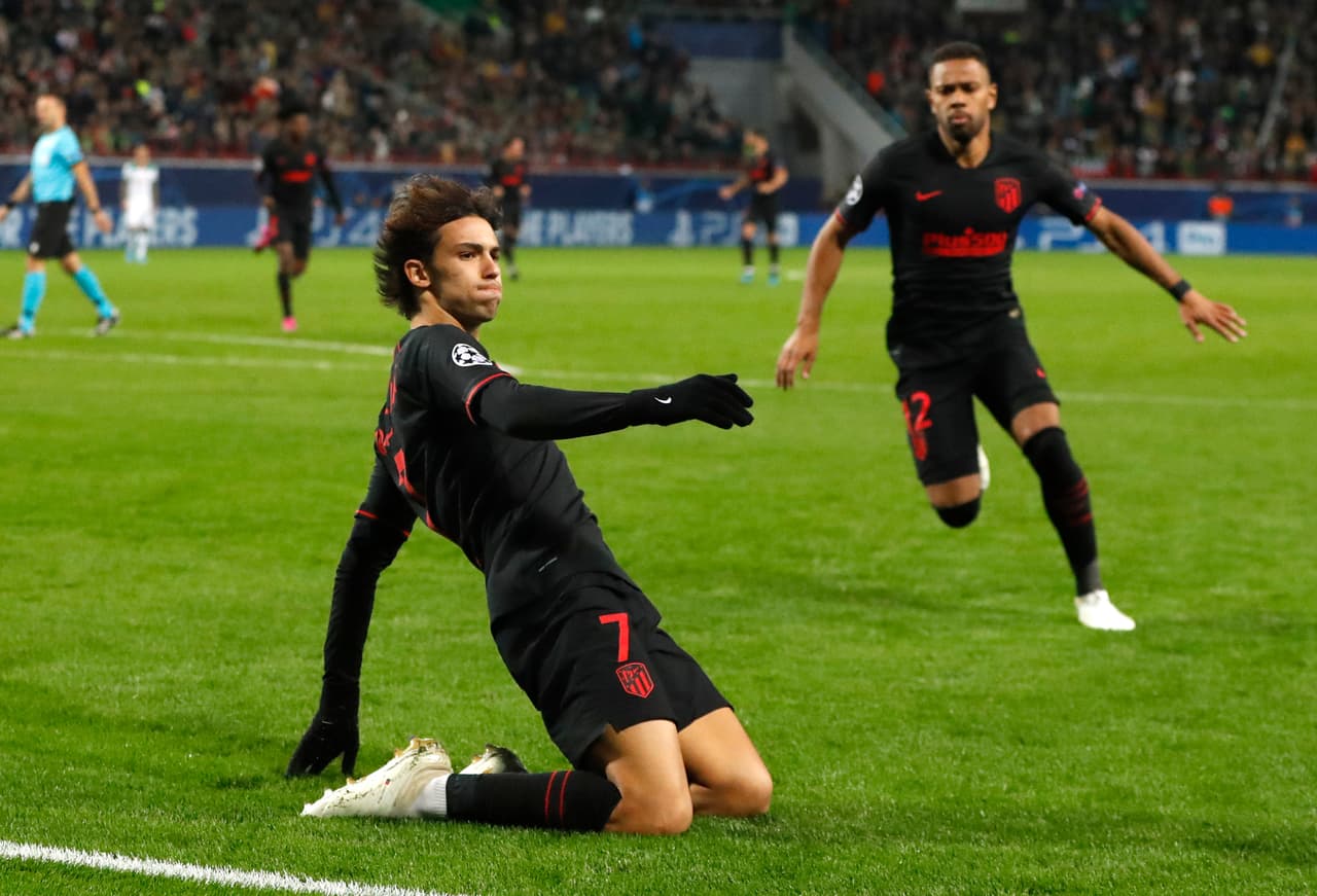 Atletico Madrid's Joao Felix celebrates after scoring the opening goal during the Champions League Group D soccer match between Lokomotiv Moscow and Atletico Madrid at the Lokomotiv Stadium in Moscow, Russia, Tuesday, Oct. 1, 2019. (AP Photo/Pavel Golovkin)
