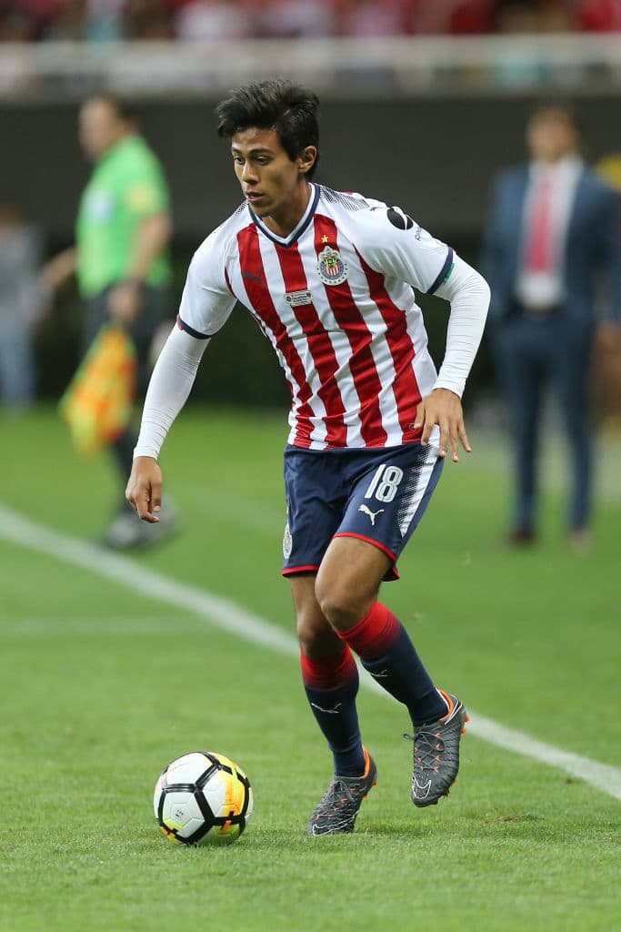ZAPOPAN, MEXICO - FEBRUARY 28: Jose Macias of Chivas drives the ball during the match between Chivas and Cibao as part of the round of 16th of the CONCACAF Champions League at Akron Stadium on February 28, 2018 in Zapopan, Mexico. (Photo by Refugio Ruiz/Getty Images)