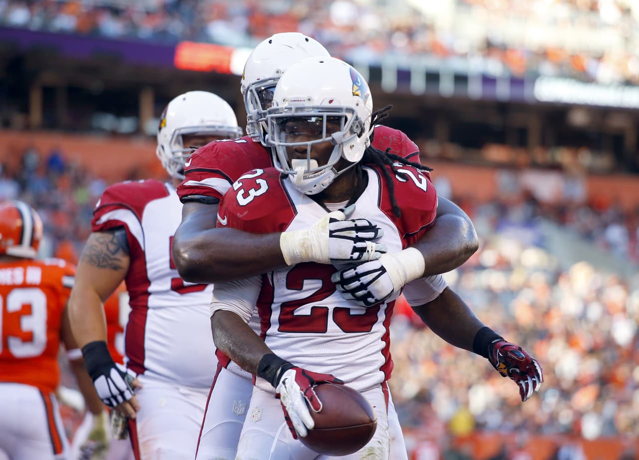 Arizona Cardinals running back Chris Johnson (23) celebrates an apparent touchdown against the Cleveland Browns but the play was called back due to a penalty during an NFL football game Sunday, Nov. 1, 2015, in Cleveland. Arizona won 34-20. (Jeff Haynes/AP Images for Panini)