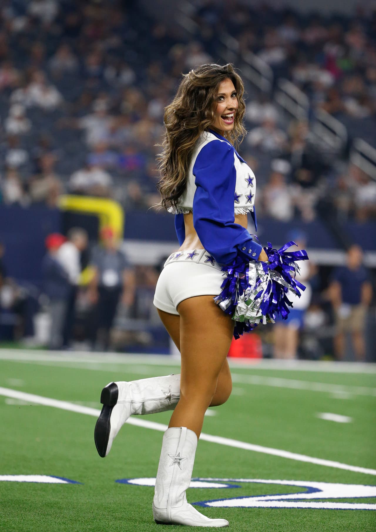 Dallas Cowboys cheerleaders perform during the second half of a preseason NFL football game against the Arizona Cardinals in Arlington, Texas, Sunday, Aug. 26, 2018. (AP Photo/Michael Ainsworth)