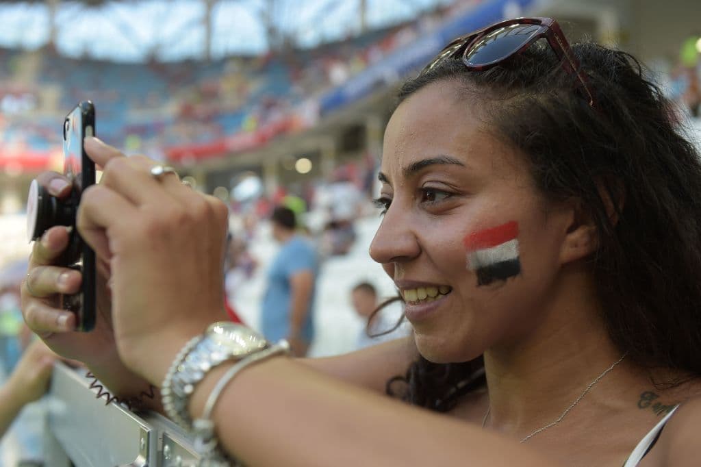 An Egypt fan takes a photo before the Russia 2018 World Cup Group A football match between Saudi Arabia and Egypt at the Volgograd Arena in Volgograd on June 25, 2018. (Photo by Nicolas ASFOURI / AFP) / RESTRICTED TO EDITORIAL USE - NO MOBILE PUSH ALERTS/DOWNLOADS (Photo credit should read NICOLAS ASFOURI/AFP/Getty Images)