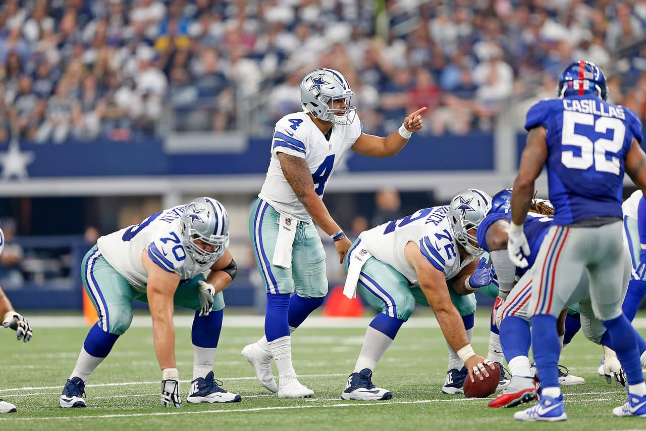 Dallas Cowboys quarterback Dak Prescott (4) calls a play at the line during the 2016 NFL week 1 regular season game against the New York Giants, Sunday, Sept. 11, 2016, in Arlington, Texas. The Giants defeated the Cowboys, 20-19. (James D. Smith via AP)