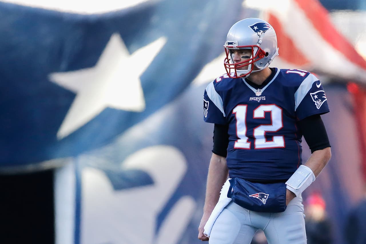 FOXBORO, MA - DECEMBER 04: Tom Brady #12 of the New England Patriots looks on during the first half against the Los Angeles Rams at Gillette Stadium on December 4, 2016 in Foxboro, Massachusetts. (Photo by Jim Rogash/Getty Images)