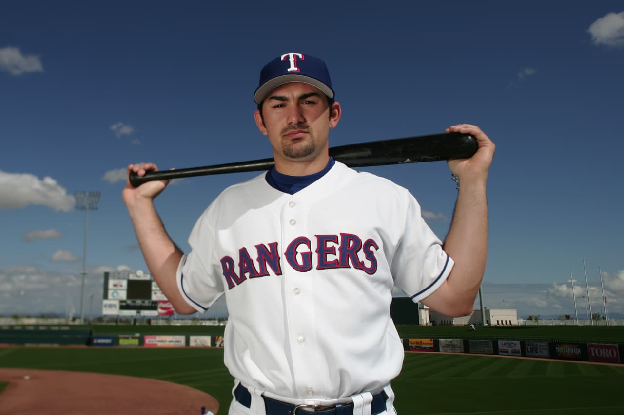 Una lesión en la muñeca hizo pensar a los Marlins que eso afectaría su poder y no dudaron en canjearlo a los Rangers de Texas, equipo con el que debutó en las Mayores el 18 de abril de 2004.