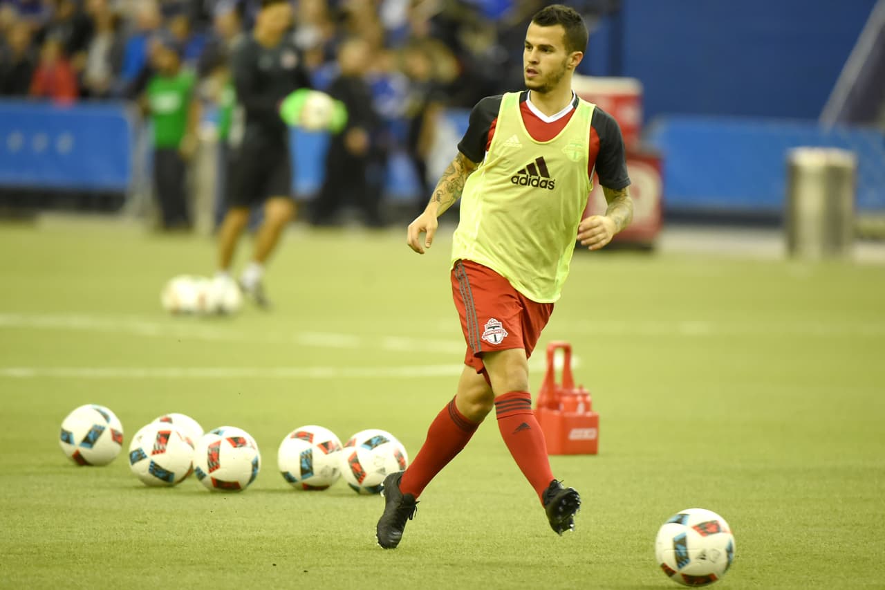 Nov 22, 2016; Montreal, Quebec, CAN; Toronto FC forward Sebastian Giovinco (10) passes the ball during warmup prior to playing Montreal Impact in the first leg of the MLS Eastern Conference Championship at Olympic Stadium. Mandatory Credit: Dan Hamilton-USA TODAY Sports