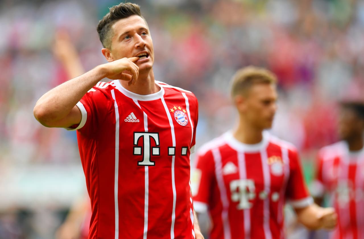 Bayern Munich's Polish striker Robert Lewandowski celebrates scoring during the German first division Bundesliga football match Werder Bremen vs Bayern Munich in Bremen, nothern Germany, on August 26, 2017. / AFP PHOTO / PATRIK STOLLARZ / RESTRICTIONS: DURING MATCH TIME: DFL RULES TO LIMIT THE ONLINE USAGE TO 15 PICTURES PER MATCH AND FORBID IMAGE SEQUENCES TO SIMULATE VIDEO. == RESTRICTED TO EDITORIAL USE == FOR FURTHER QUERIES PLEASE CONTACT DFL DIRECTLY AT + 49 69 650050 (Photo credit should read PATRIK STOLLARZ/AFP/Getty Images)