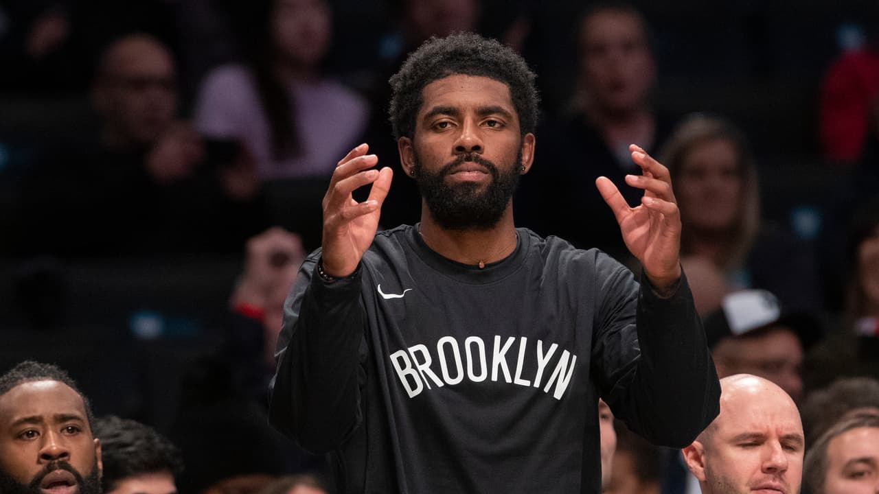 Brooklyn Nets guard Kyrie Irving reacts from the bench during the first half of an exhibition NBA basketball game against the Sesi/Franca Basketball Club, Friday, Oct. 4, 2019, in New York. (AP Photo/Mary Altaffer)