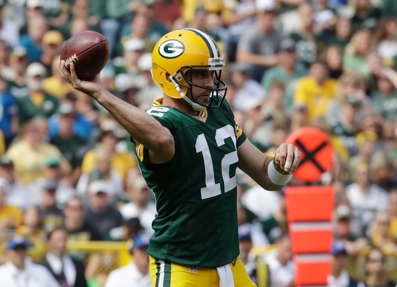 Green Bay Packers' Aaron Rodgers throws during the first half of an NFL football game against the Detroit Lions Sunday, Sept. 25, 2016, in Green Bay, Wis. (AP Photo/Morry Gash)