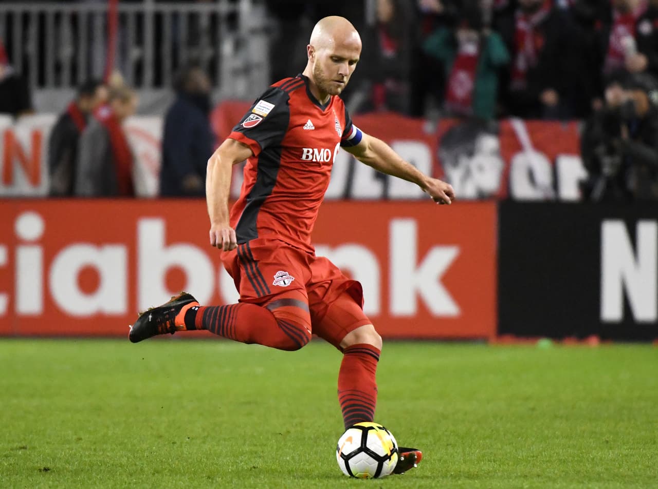 Feb 27, 2018; Toronto, Ontario, USA; Toronto FC midfielder Michael Bradley (4) makes a pass against Colorado Rapids in the first half of their CONCACAF Champions League game at BMO Field. Mandatory Credit: Dan Hamilton-USA TODAY Sports