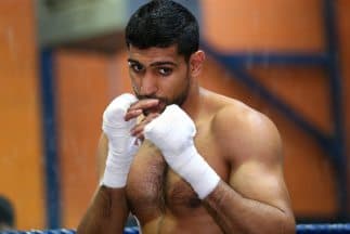 Khan quiere robarle el show a Mayweather Jr.