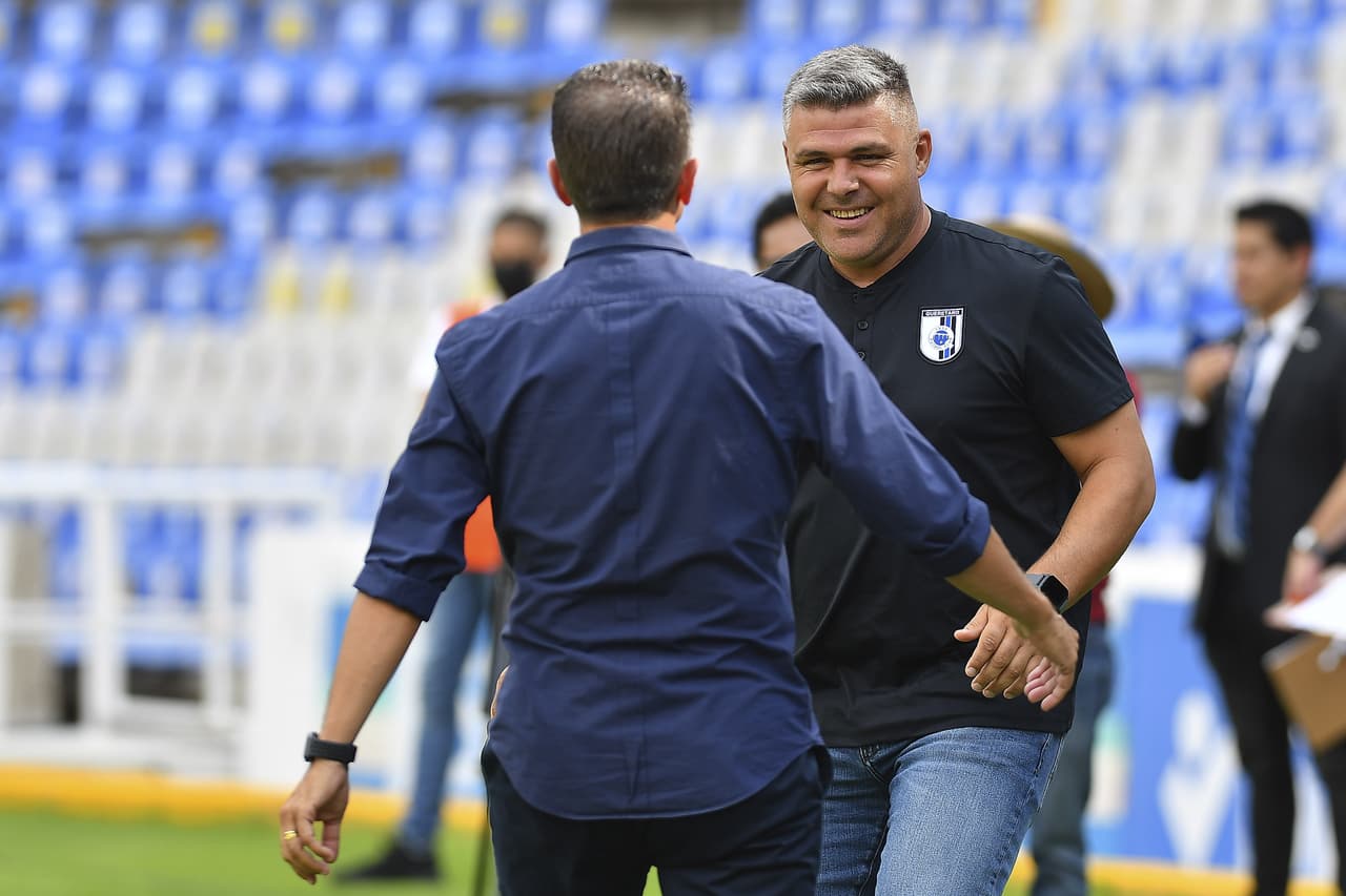 Valiño y Gerk se saludaron efusivamente.