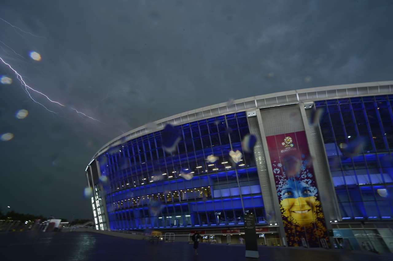 A lightning is seen above the Donbass Arena during the Euro 2012 championships football match Ukraine vs France on June 15, 2012 in Donetsk. AFP PHOTO/ FILIPPO MONTEFORTE (Photo credit should read FILIPPO MONTEFORTE/AFP/GettyImages)