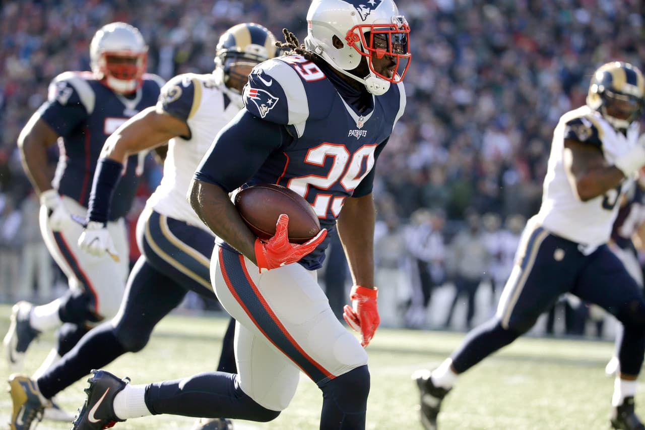 New England Patriots running back LeGarrette Blount (29) runs for a touchdown against the Los Angeles Rams during the first half of an NFL football game, Sunday, Dec. 4, 2016, in Foxborough, Mass. (AP Photo/Elise Amendola)