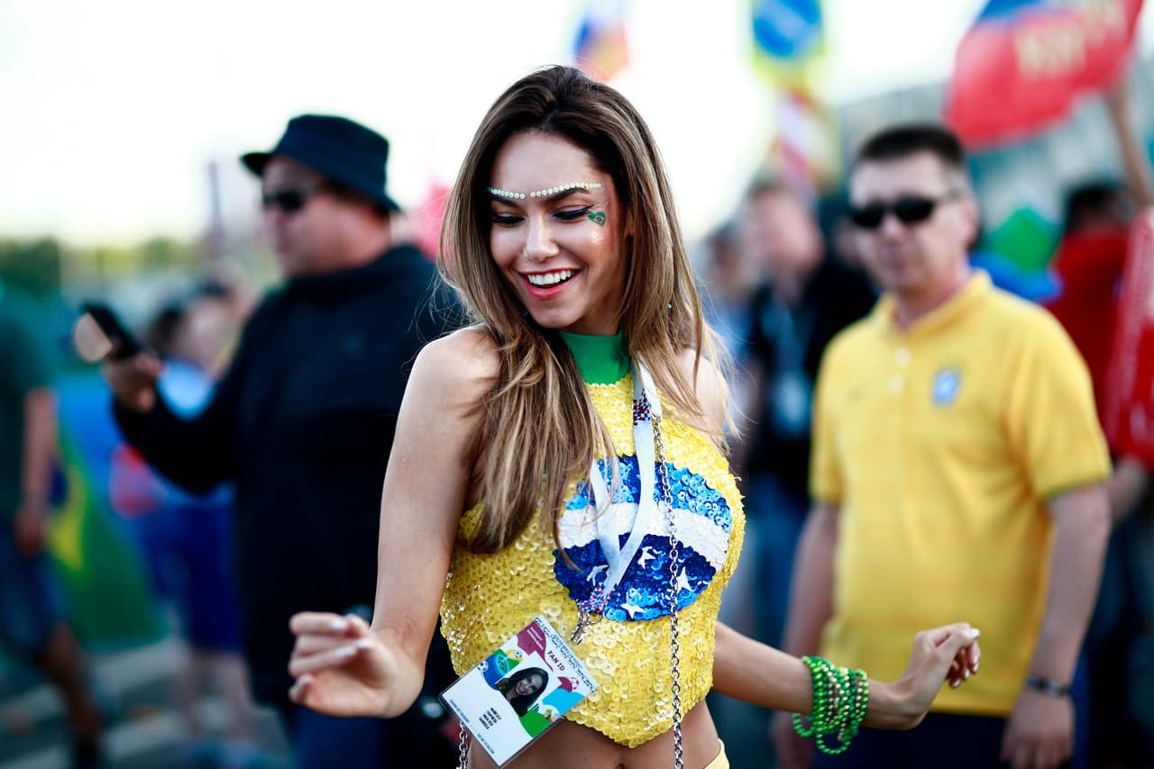 A Brazil fan cheers before the Russia 2018 World Cup quarter-final football match between Brazil and Belgium at the Kazan Arena in Kazan on July 6, 2018. (Photo by BENJAMIN CREMEL / AFP) / RESTRICTED TO EDITORIAL USE - NO MOBILE PUSH ALERTS/DOWNLOADS (Photo credit should read BENJAMIN CREMEL/AFP/Getty Images)
