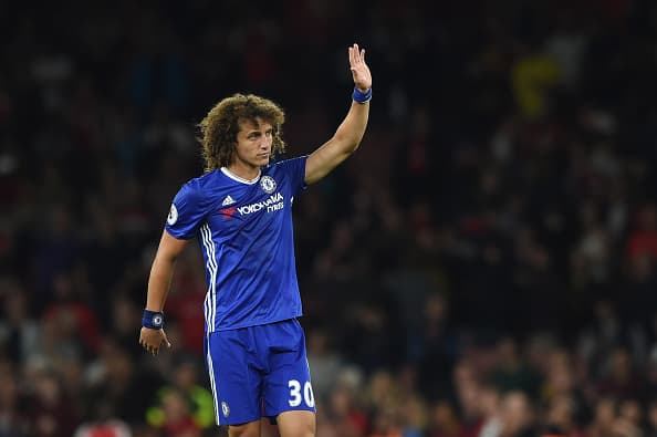 LONDON, ENGLAND - SEPTEMBER 24: David Luiz of Chelsea waves to the fans following the final whistle during the Premier League match between Arsenal and Chelsea at the Emirates Stadium on September 24, 2016 in London, England. (Photo by Chelsea Football Club/Chelsea FC via Getty Images)