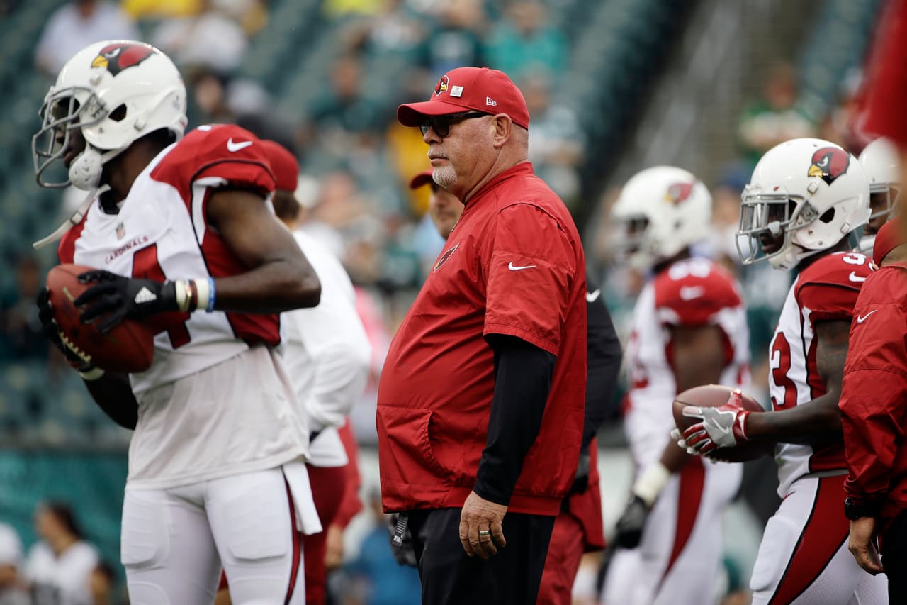 Arizona Cardinals head coach Bruce Arians watches warm-ups before an NFL football game against the Philadelphia Eagles, Sunday, Oct. 8, 2017, in Philadelphia. (AP Photo/Matt Rourke)