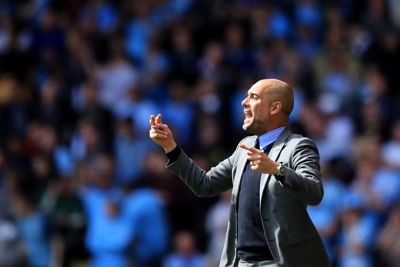 WATFORD, ENGLAND - MAY 21: Manchester City manager Pep Guardiola gives instructions during the Premier League match between Watford and Manchester City at Vicarage Road on May 21, 2017 in Watford, England. (Photo by Richard Heathcote/Getty Images)