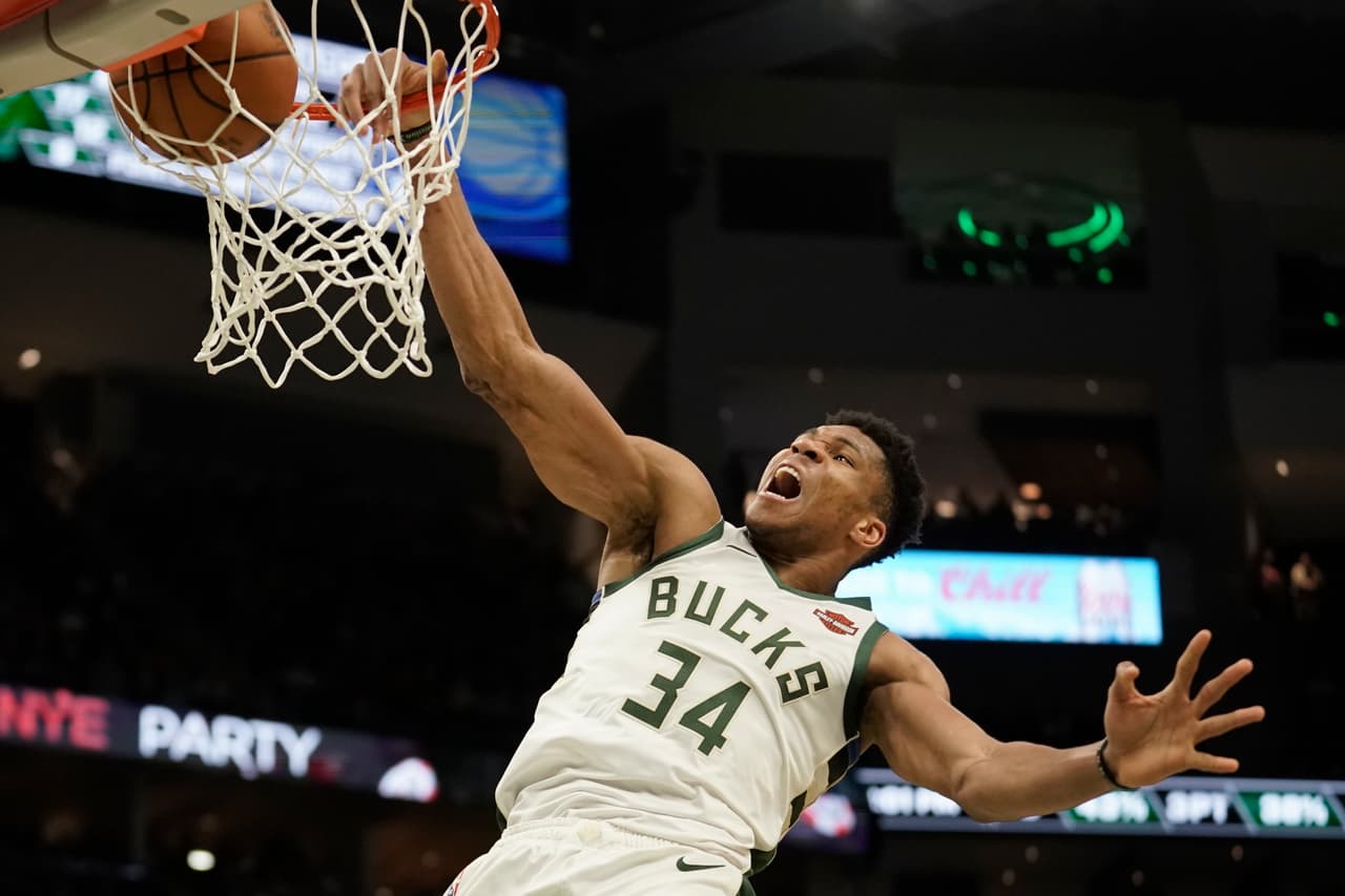Milwaukee Bucks' Giannis Antetokounmpo dunks during the second half of an NBA basketball game against the Indiana Pacers Sunday, Dec. 22, 2019, in Milwaukee. The Bucks won 117-89. (AP Photo/Morry Gash)