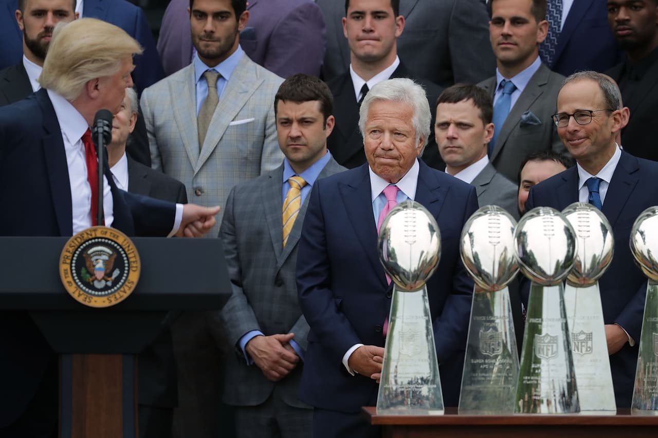 WASHINGTON, DC - APRIL 19: New England Patriots owner Robert Kraft (C) is congratulated by U.S. President Donald Trump during an event celebrating the team's Super Bowl win on the South Lawn at the White House April 19, 2017 in Washington, DC. It was the team's fifth Super Bowl victory since 1960. (Photo by Chip Somodevilla/Getty Images)