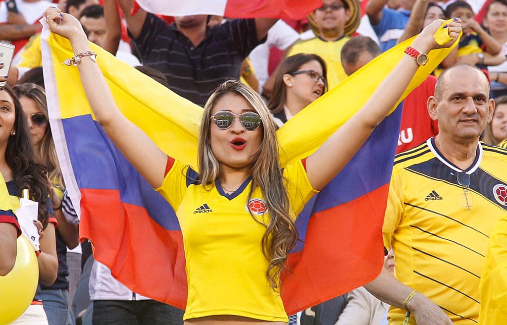 EAST RUTHERFORD, NEW JERSEY - JUNE 17: A fan of Colombia cheers her team on during a Quarterfinal match between Colombia and Peru at MetLife Stadium as part of Copa America Centenario US 2016 on June 17, 2016 in East Rutherford, New Jersey, US. Colombia won the 0-0 game by penalty kicks. (Photo by Chris Szagola/LatinContent/Getty Images)