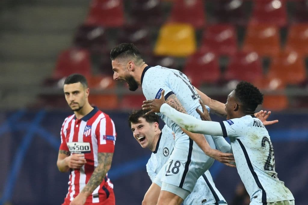 Chelsea's French striker Olivier Giroud (C) celebrates after scoring during the UEFA Champions League round of 16 first leg football match between Club Atletico de Madrid and Chelsea at the Arena Nationala stadium in Bucharest on February 23, 2021. (Photo by Daniel MIHAILESCU / AFP) (Photo by DANIEL MIHAILESCU/AFP via Getty Images)