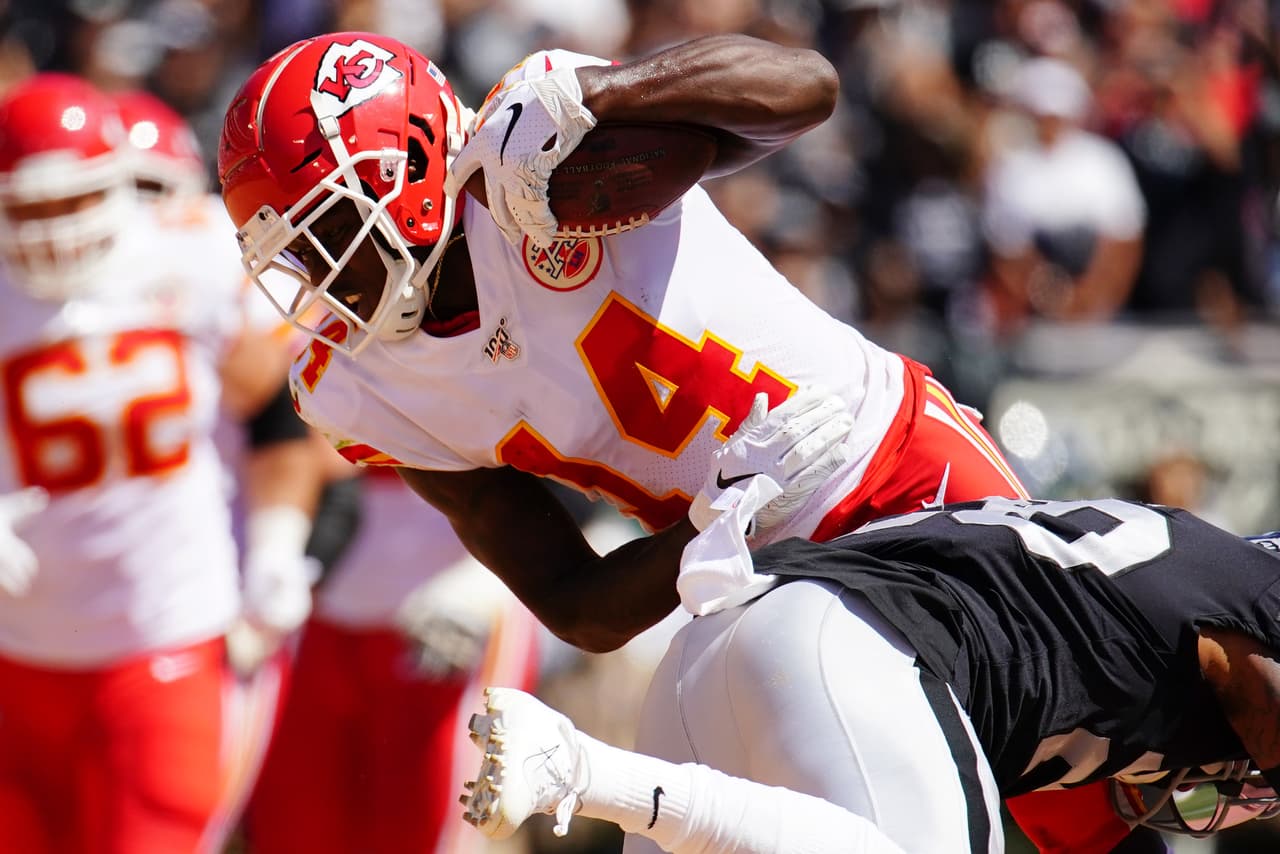 OAKLAND, CALIFORNIA - SEPTEMBER 15: Sammy Watkins #14 of the Kansas City Chiefs is tackled by Daryl Worley #20 of the Oakland Raiders during the second quarter at RingCentral Coliseum on September 15, 2019 in Oakland, California. (Photo by Daniel Shirey/Getty Images)