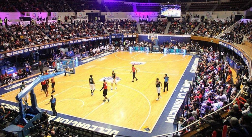 <b>Gimnasio Olímpico Juan de la Barrera -</b> tuvo eventos de voleibol y gimnasia. Hoy en día es la casa de los Capitanes de México en el baloncesto nacional.