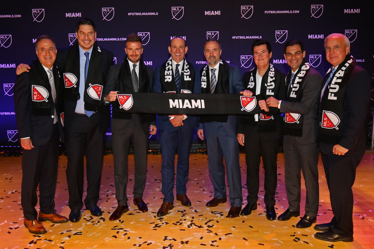 Jan 29, 2018; Miami, FL, USA; From left MLS team owners Jorge Mas, Marcelo Claure, David Beckham and MLS commissioner Don Garber stand on stage with MLS Team owners Jose Mas, Simon Fuller, and Miami city mayor Francis Suarez and Miami-Dade county mayor Carlos Gimenez during the Miami MLS expansion team announcement at the Adrienne Arsht Center. Mandatory Credit: Aaron Doster-USA TODAY Sports
