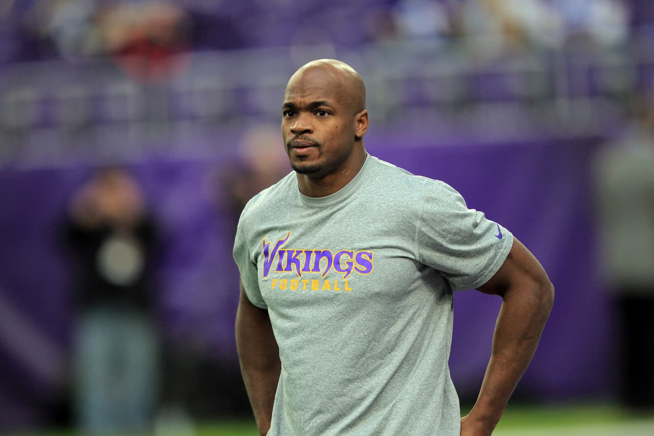 Minnesota Vikings running back Adrian Peterson warms up before the start of an NFL football game between the Indianapolis Colts and the Minnesota Vikings Sunday, Dec. 18, 2016, in Minneapolis. (AP Photo/Andy Clayton-King)