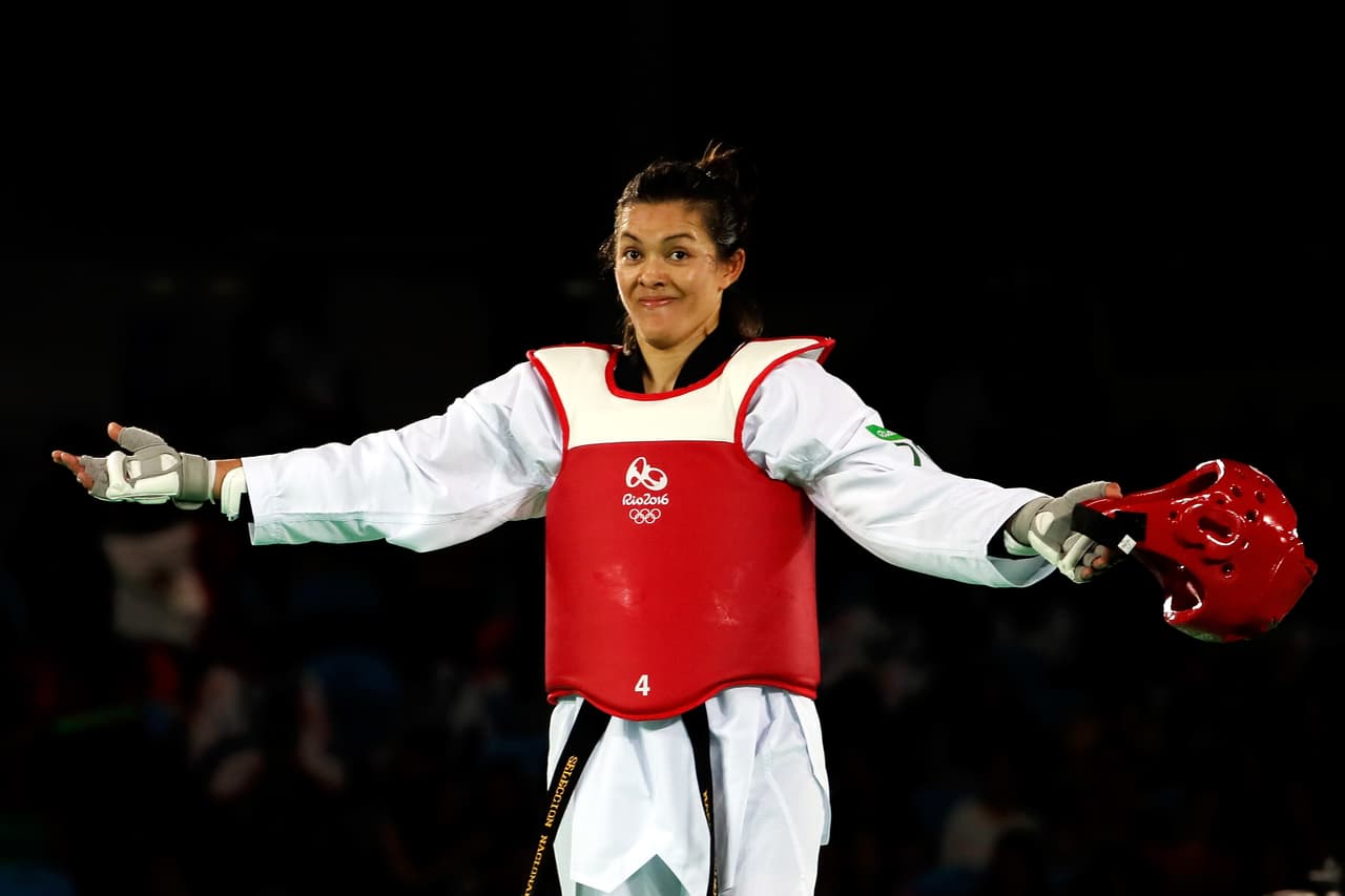 RIO DE JANEIRO, BRAZIL - AUGUST 20: Maria DEL Rosario Espinoza Espinoza of Mexico celebrates after defeating Jackie Galloway of the United States to win the Women's +67kg Taekwondo Semifinal match against at the Rio 2016 Olympic Games on August 20, 2016 in Rio de Janeiro, Brazil. (Photo by Jamie Squire/Getty Images)
