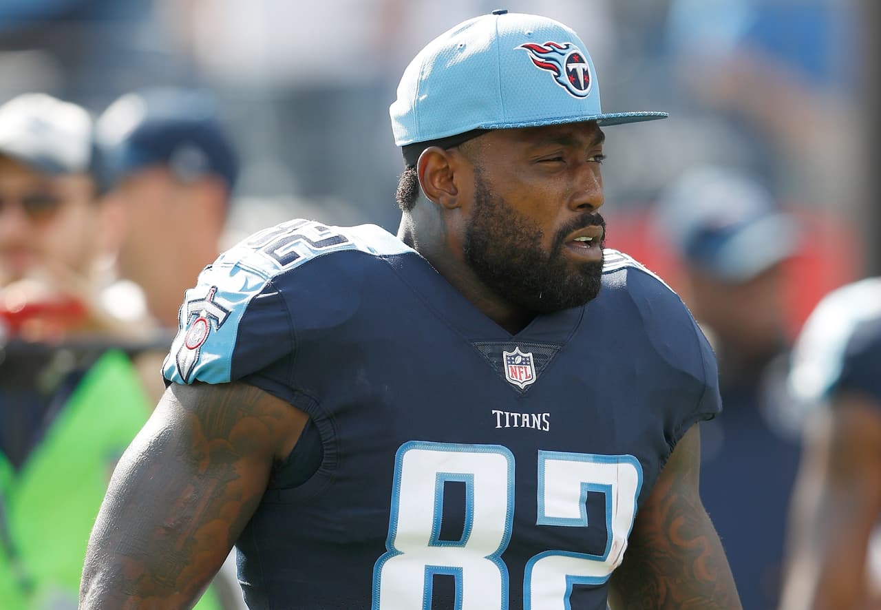 Tennessee Titans tight end Delanie Walker (82) looks on from the sidelines during an NFL football game against the Baltimore Ravens, Sunday, Nov. 5, 2017, in Nashville, Ten. The Titans won 23-20. (Scott Boehm via AP)