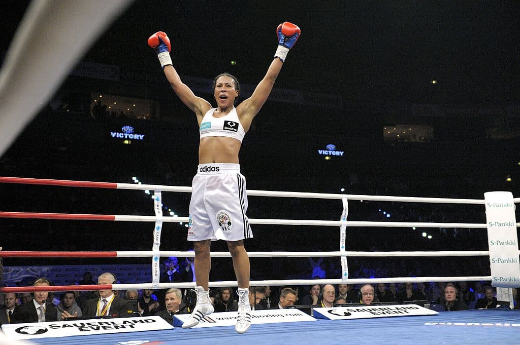 Norway's Cecilia Braekhus celebrates winning her WBA, WBC and WBO middleweight class World Championship professional boxing match against Kuulei Kupihea of the United States at the "Night of the Heavyweights" event in Helsinki, Finland, on December 3, 2011. AFP PHOTO LEHTIKUVA / Heikki Saukkomaa *** FINLAND OUT *** (Photo credit should read HEIKKI SAUKKOMAA/AFP/Getty Images)