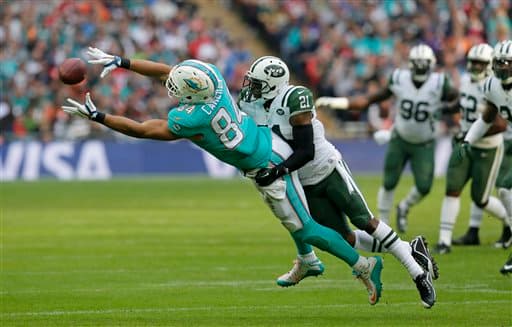 Londres recibió el primero de tres partidos NFL que tendrán, en donde los Jets dominaron a los Dolphins 27-14. Checa las imágenes del duelo.