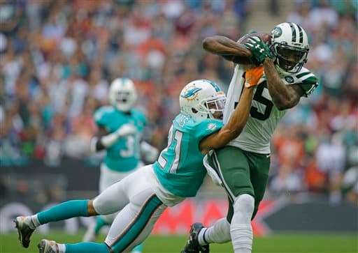 Londres recibió el primero de tres partidos NFL que tendrán, en donde los Jets dominaron a los Dolphins 27-14. Checa las imágenes del duelo.