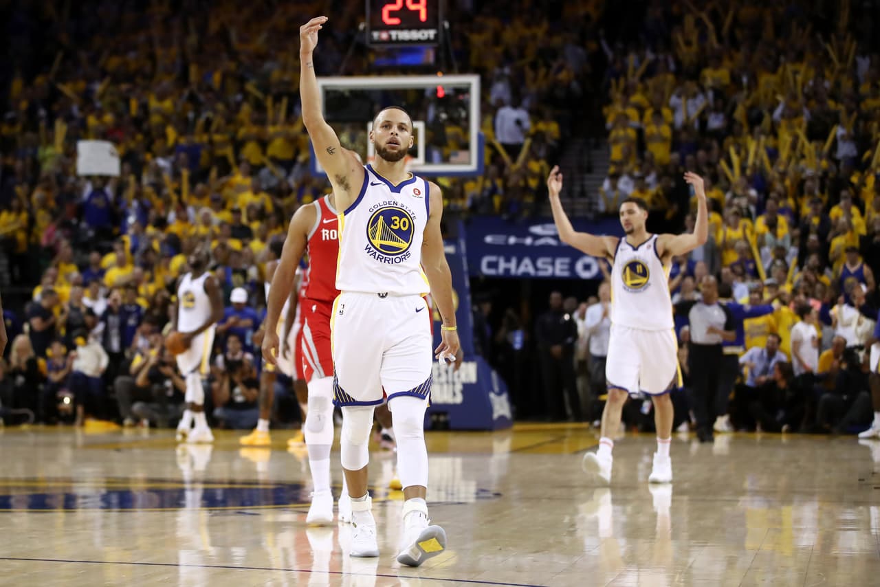 OAKLAND, CA - MAY 20: Stephen Curry #30 of the Golden State Warriors reacts after a play against the Houston Rockets during Game Three of the Western Conference Finals of the 2018 NBA Playoffs at ORACLE Arena on May 20, 2018 in Oakland, California. NOTE TO USER: User expressly acknowledges and agrees that, by downloading and or using this photograph, User is consenting to the terms and conditions of the Getty Images License Agreement. (Photo by Ezra Shaw/Getty Images)