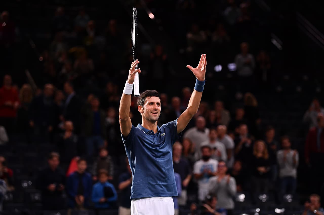 PARIS, FRANCE - NOVEMBER 01: Novak Djokovic of Serbia celebrates after winning in his Round of 16 match against Damir Dzumhur of Bosnia who retired injured during Day 4 of the Rolex Paris Masters on November 1, 2018 in Paris, France. (Photo by Justin Setterfield/Getty Images)