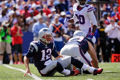 Los Buffalo Bills no pudieron contender a la poderosa ofensiva de los New England Patriots y perdieron en casa 40-32. Checa las mejores imágenes de este duelo.