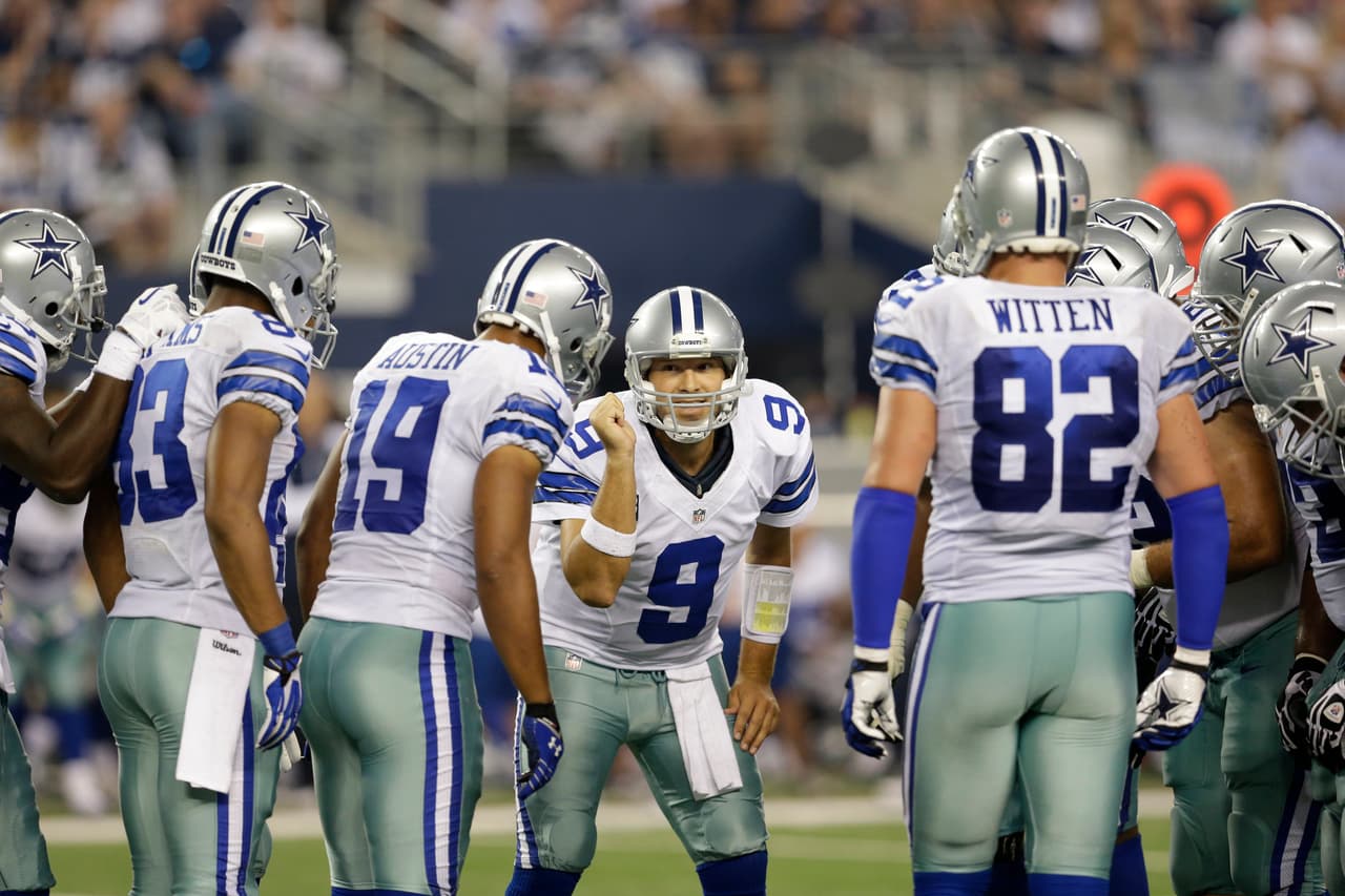 Miles Austin (19), Jason Witten (82) and the rest of the offense listen as quarterback Tony Romo (9) directs the huddle during an NFL football game against the New York Giants, Sunday, Sept. 8, 2013, in Arlington, Texas. The Cowboys won 36-31. (AP Photo/LM Otero)