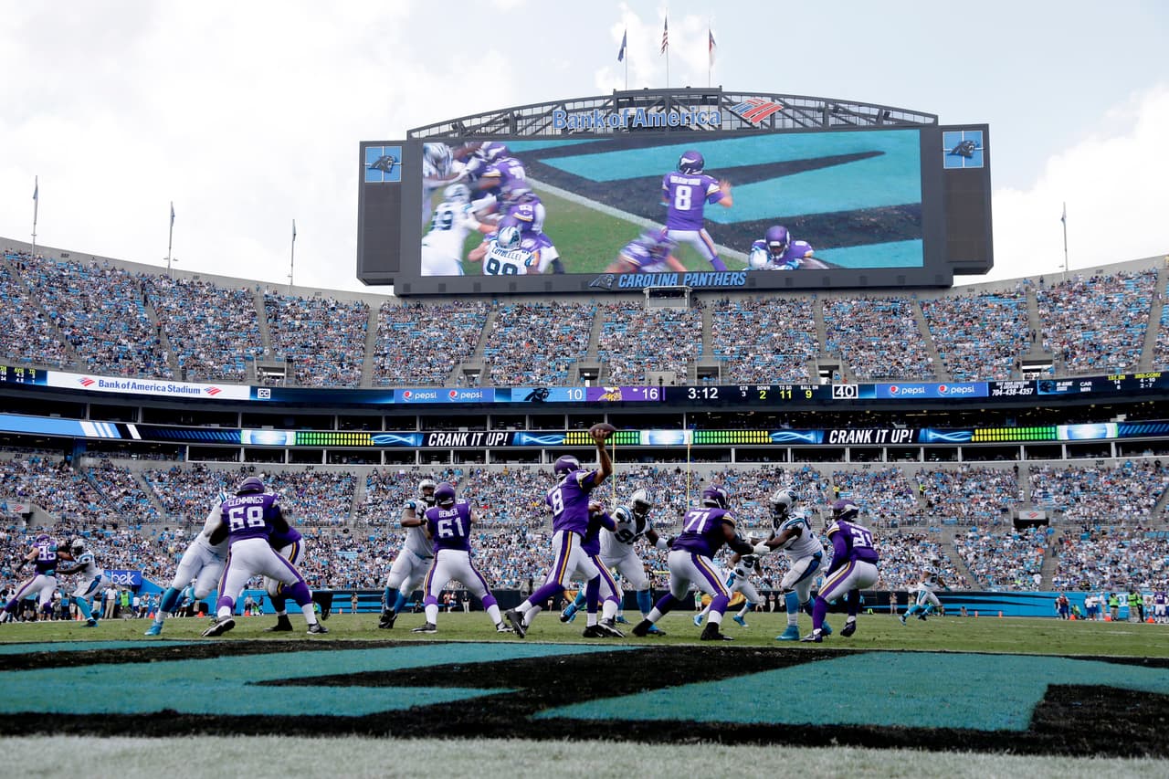 Minnesota Vikings' Sam Bradford (8) looks to pass against the Carolina Panthers in the second half of an NFL football game in Charlotte, N.C., Sunday, Sept. 25, 2016. (AP Photo/Bob Leverone)