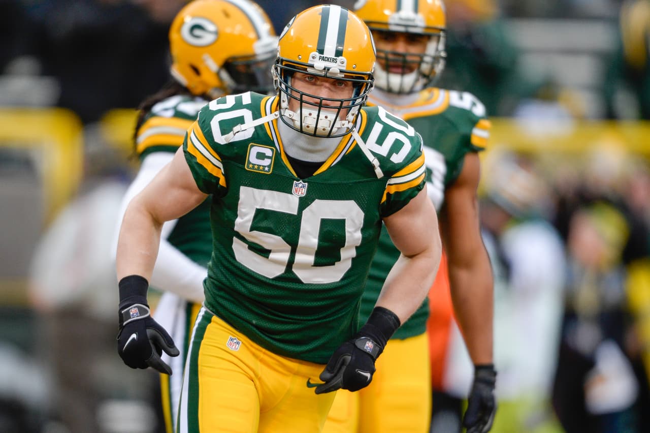 Green Bay Packers linebacker A.J. Hawk (50) warms up in 10 degree temperature prior to the NFL wild-card football game against the San Francisco 49ers on Sunday, Jan 5, 2014 in Green Bay. The 49ers won the game 23-20. (AP photo / Jim Mahoney)
