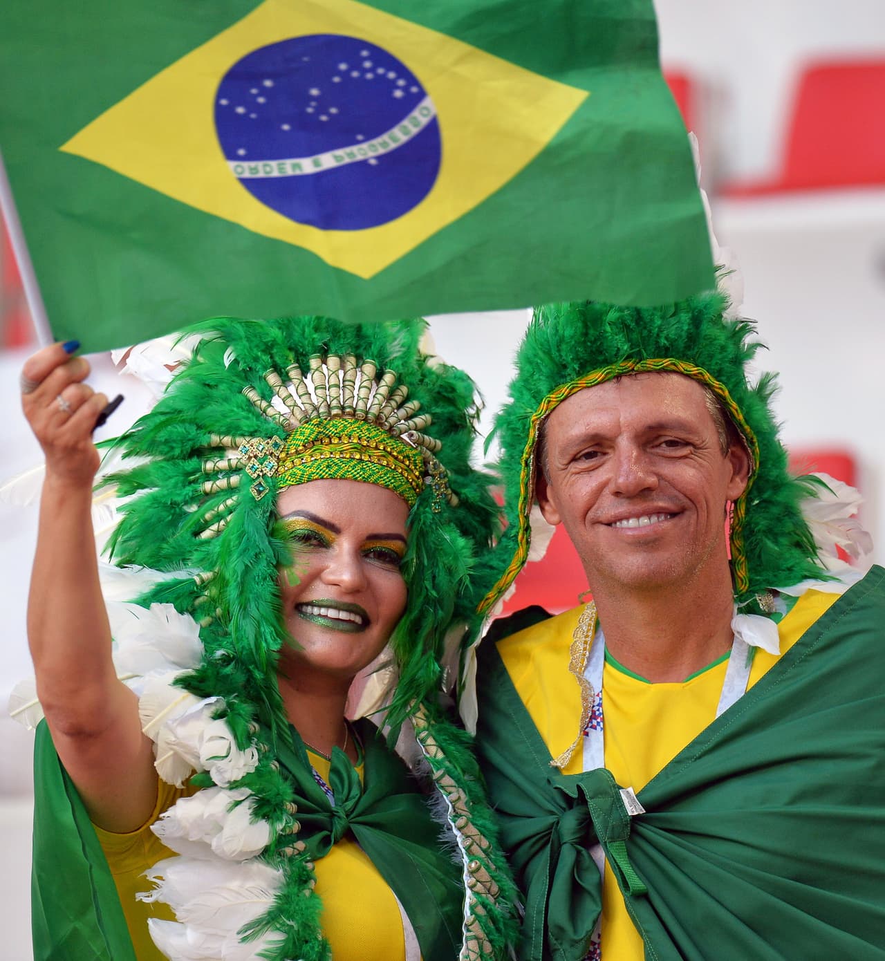 Moscow (Russian Federation), 27/06/2018.- Supporters of Brazil cheer prior to the FIFA World Cup 2018 group E preliminary round soccer match between Serbia and Brazil in Moscow, Russia, 27 June 2018. (RESTRICTIONS APPLY: Editorial Use Only, not used in association with any commercial entity - Images must not be used in any form of alert service or push service of any kind including via mobile alert services, downloads to mobile devices or MMS messaging - Images must appear as still images and must not emulate match action video footage - No alteration is made to, and no text or image is superimposed over, any published image which: (a) intentionally obscures or removes a sponsor identification image; or (b) adds or overlays the commercial identification of any third party which is not officially associated with the FIFA World Cup) (Mundial de Fútbol, Brasil, Moscú, Rusia) EFE/EPA/PETER POWELL EDITORIAL USE ONLY