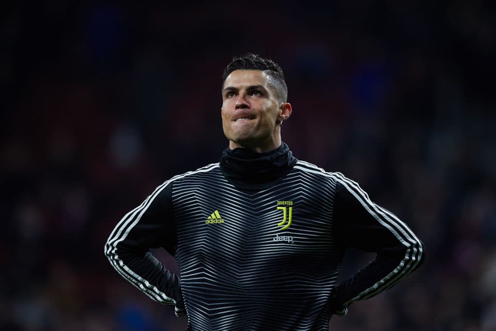 MADRID, SPAIN - FEBRUARY 20: Cristiano Ronaldo of Juventus warms up before the UEFA Champions League Round of 16 First Leg match between Club Atletico de Madrid and Juventus at Estadio Wanda Metropolitano on February 20, 2019 in Madrid, Spain. (Photo by Gonzalo Arroyo Moreno/Getty Images)